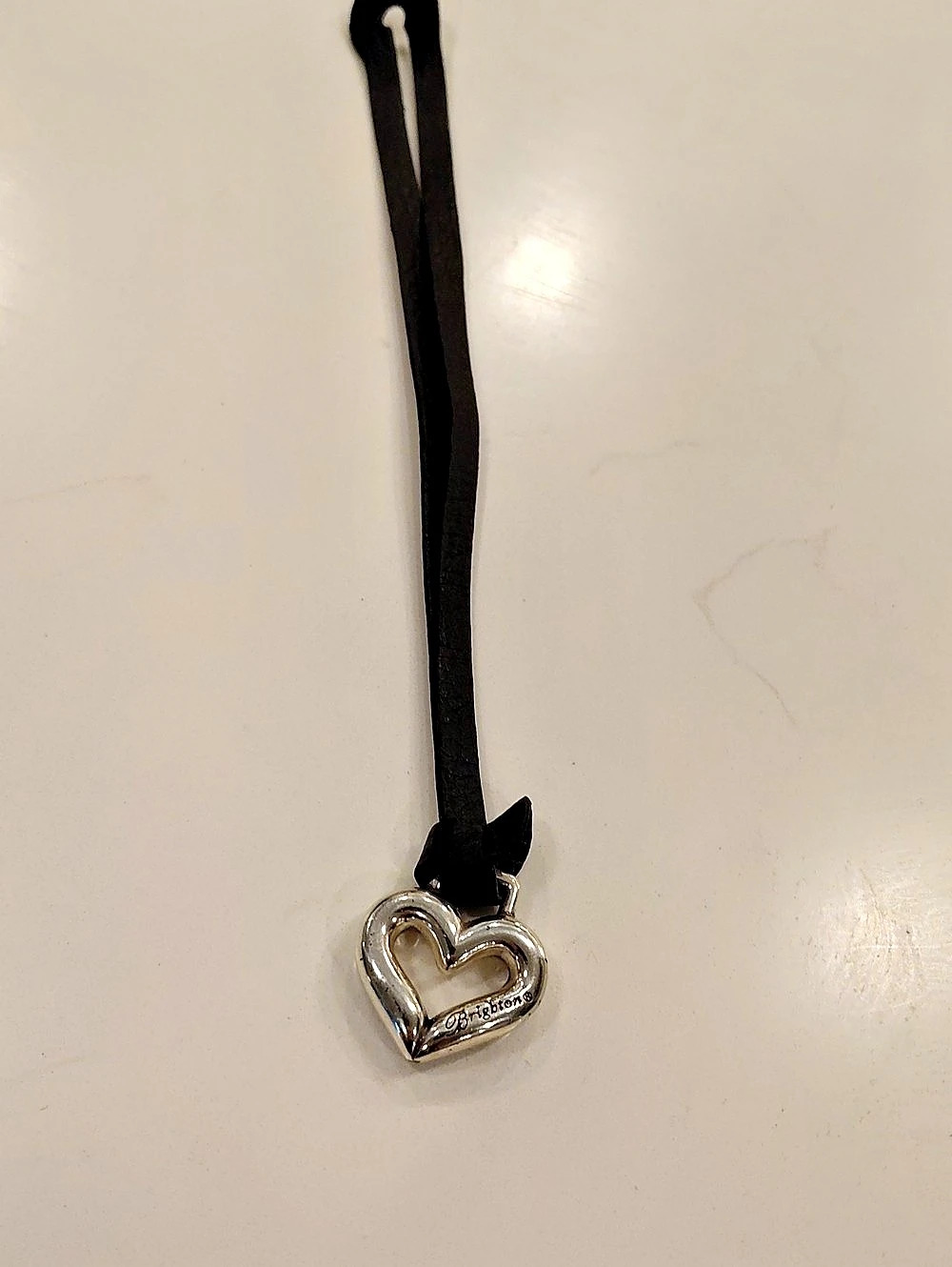 Brighton Cascade Heart Cord Purse Fob In Black And Silver.